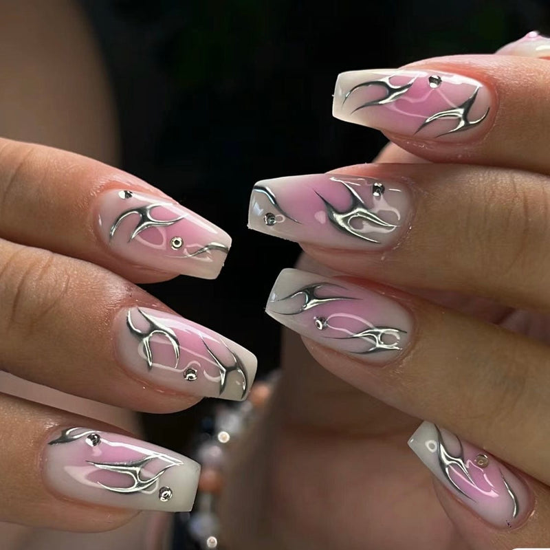 Vibrant rose pink chrome nails with a radiant mirror finish.