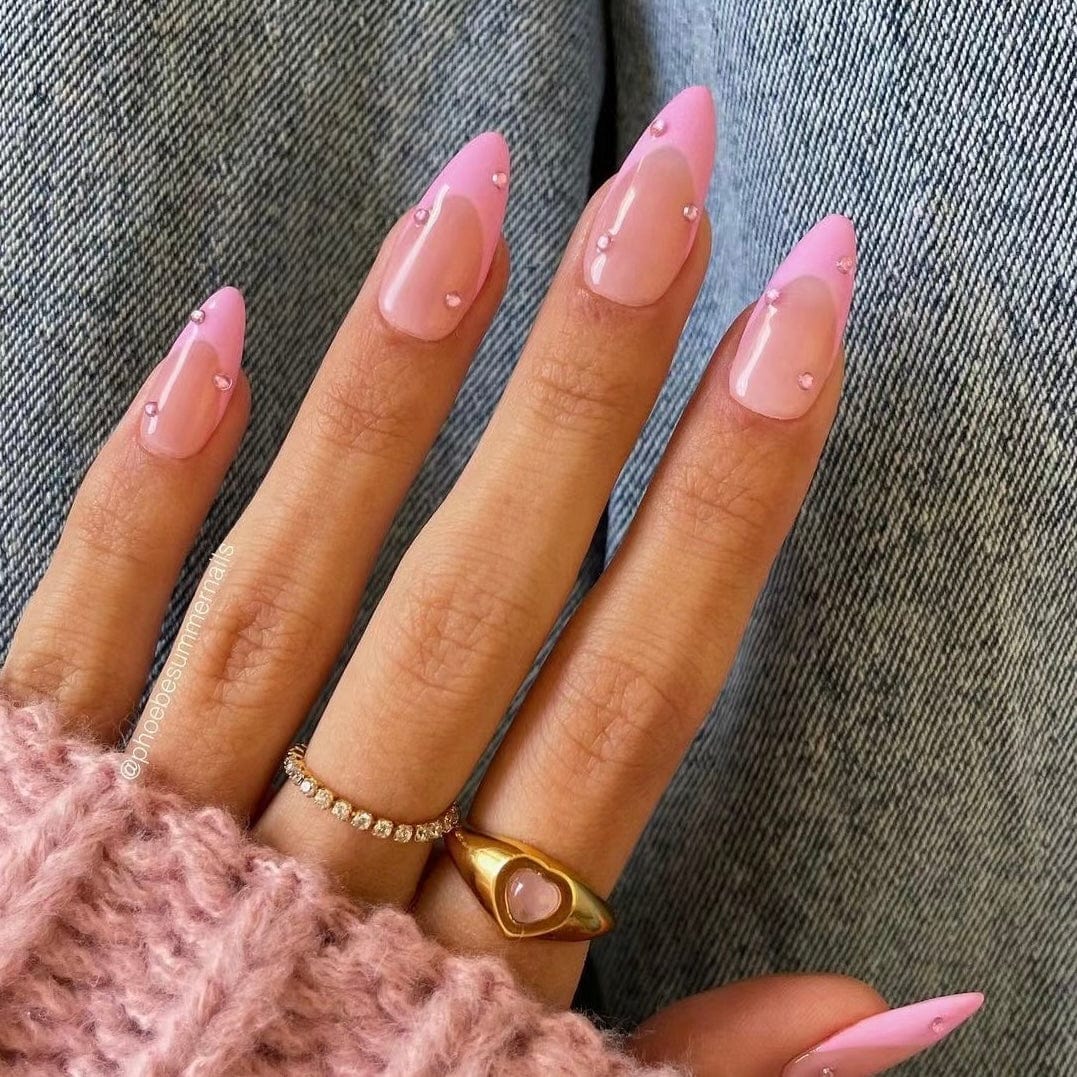 Step into elegance with our 'French mani pink' nails, harmoniously blending traditional charm with contemporary flair. 