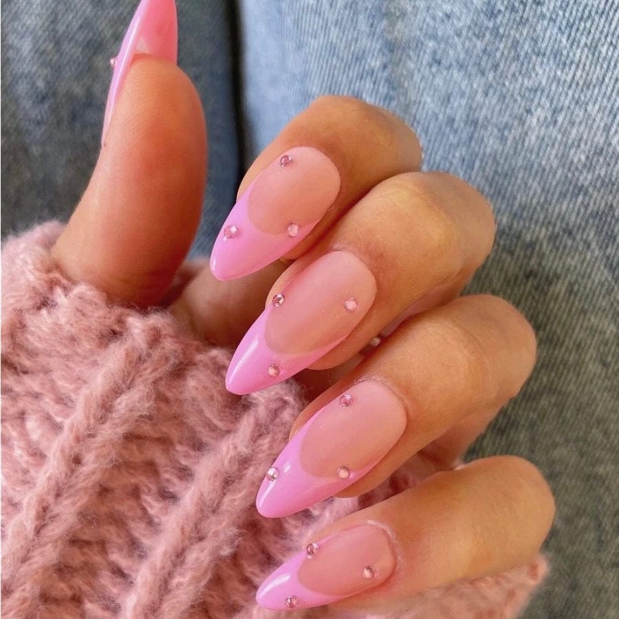 Whether you're attending a special event or simply want to add a touch of femininity to your everyday look, our pink French tip nails are sure to captivate.
