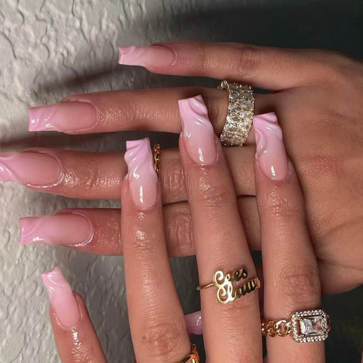 Step into elegance with our mesmerizing collection featuring "light pink ombre nails". Each nail embodies a graceful transition of hues, blending delicate shades of pink for a captivating ombre effect. 