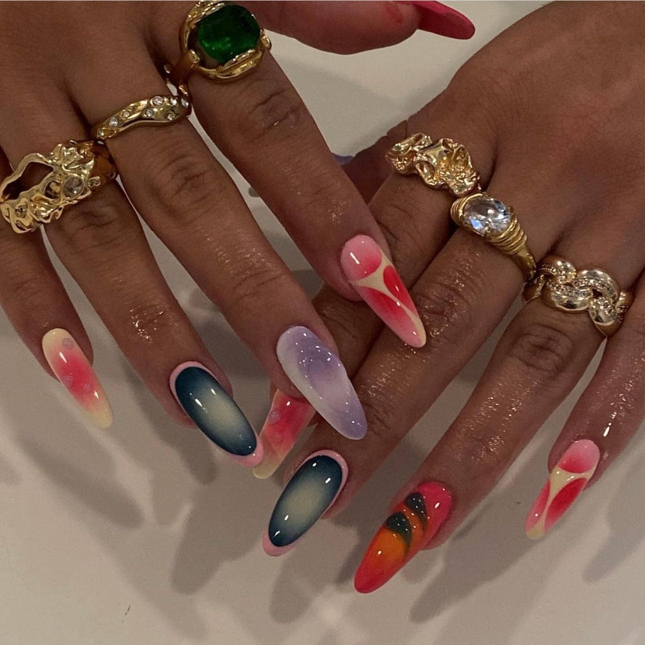 Cute colorful nails featuring a vibrant mix of bright hues for a playful and cheerful manicure.